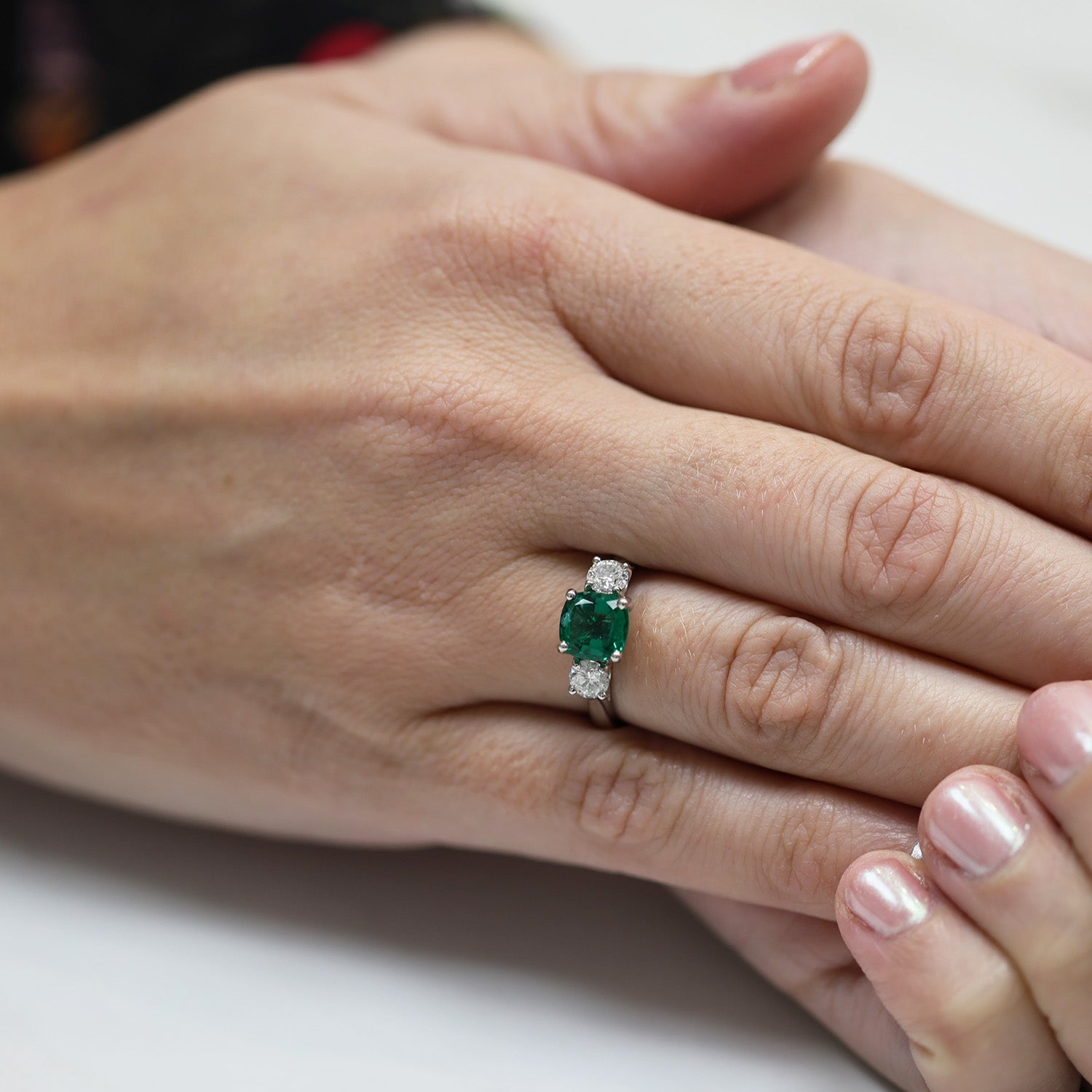 Platinum Cushion Shape Emerald & Diamond Three Stone Ring