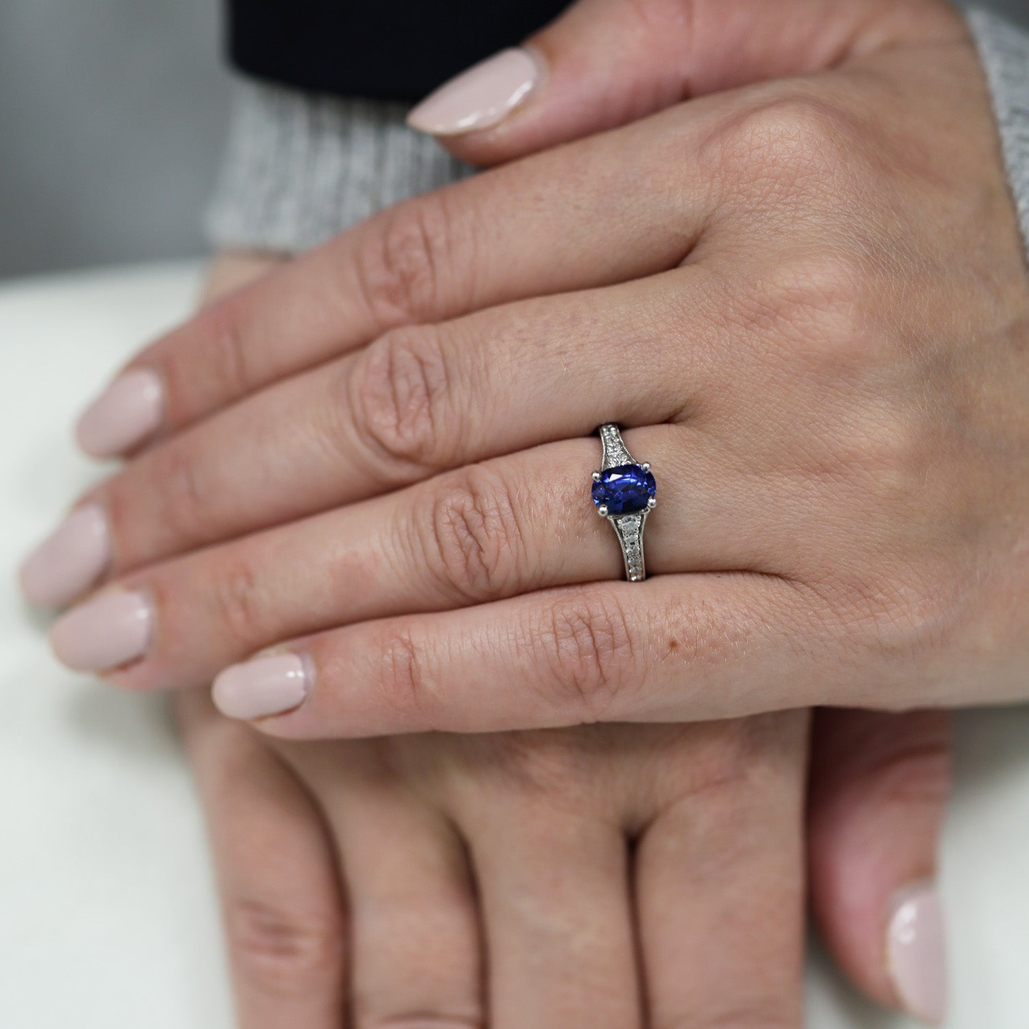 Platinum Oval Claw Set Sapphire Ring With Bead Edge Grain Set Diamond Shoulders