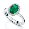 Platinum Oval Cut Emerald And Diamond Halo Ring