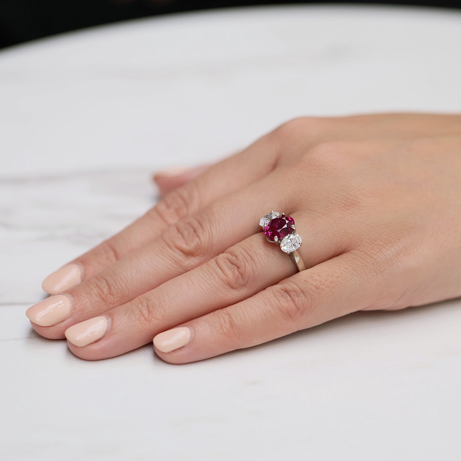 Platinum Oval Unheated Madagascan Ruby And Oval Diamond Three Stone Ring