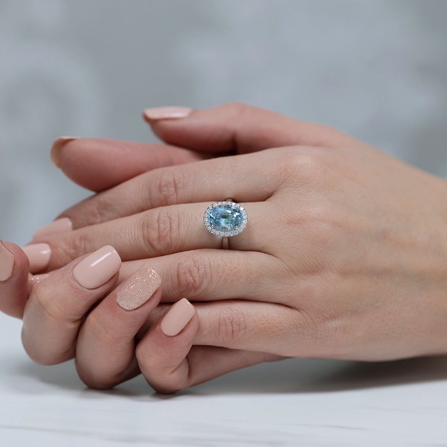 Berry's Platinum Oval Aquamarine And Diamond Halo Ring - Berry's Jewellers