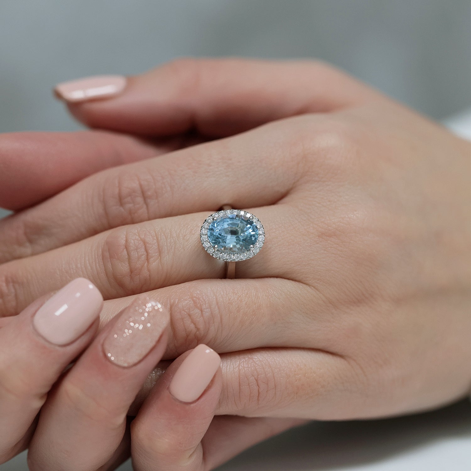 Berry's Platinum Oval Aquamarine And Diamond Halo Ring - Berry's Jewellers