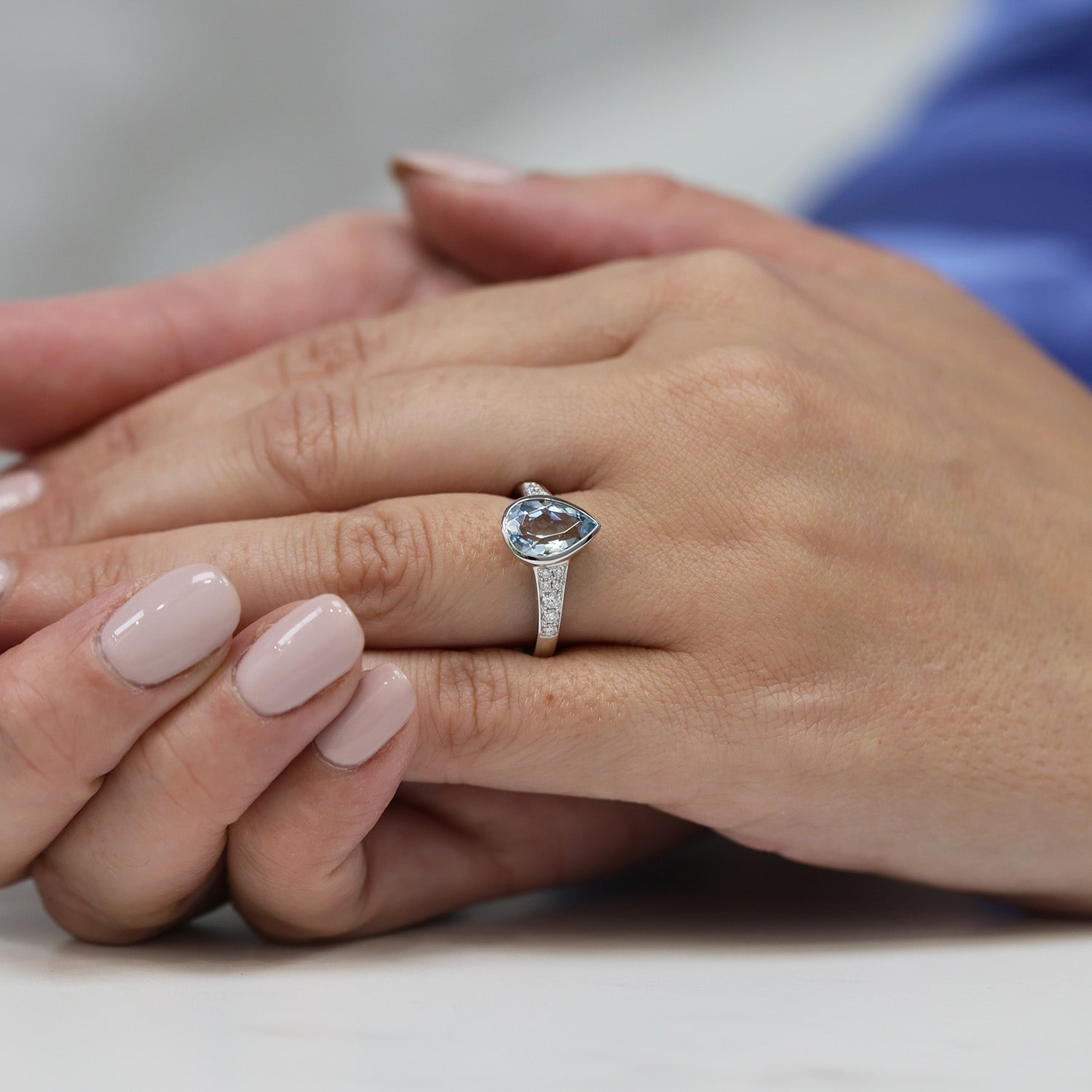 18ct White Gold Pear Cut Aquamarine Ring With Diamond Set Shoulders