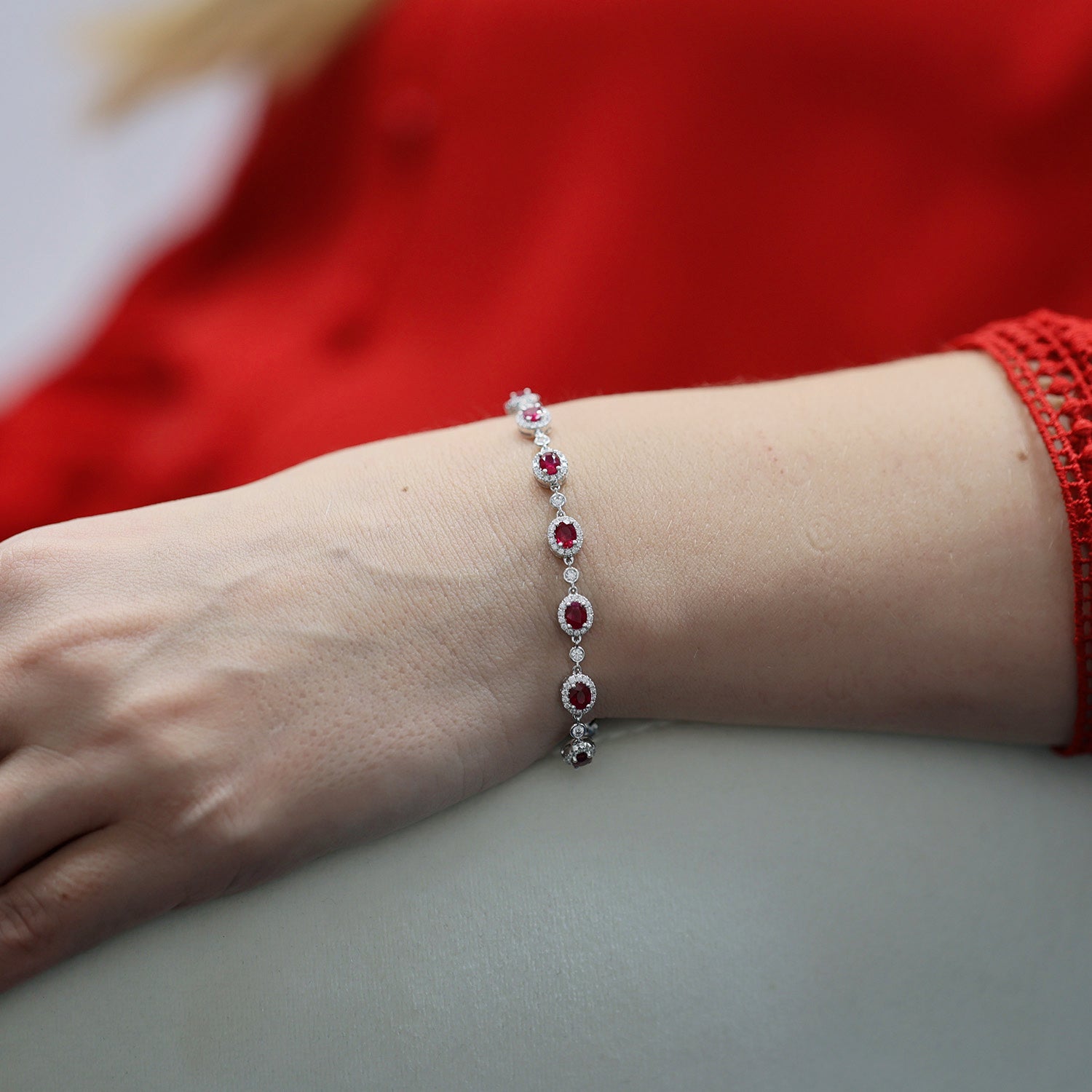 18ct White Gold Oval Ruby And Diamond Halo Bracelet