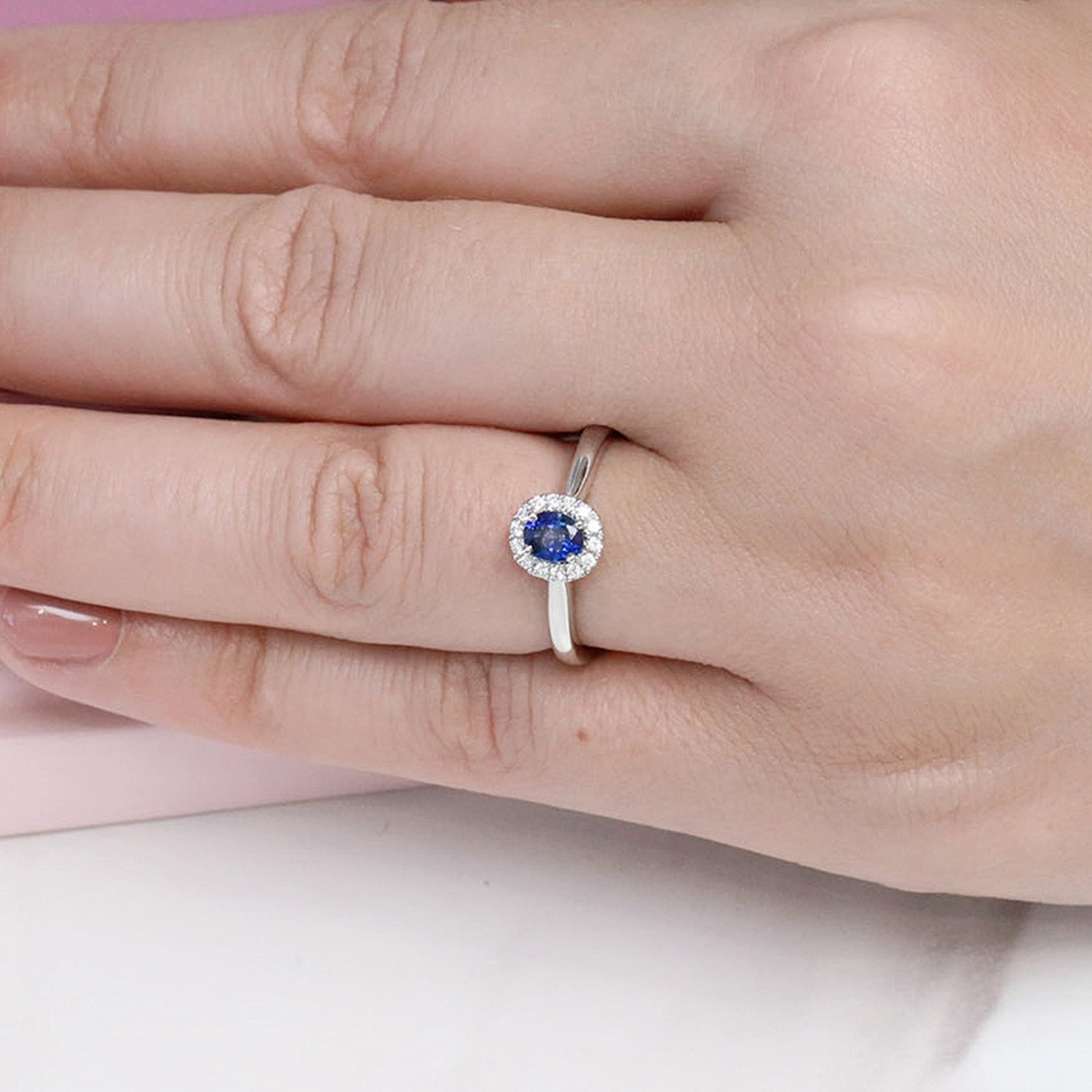 Berry's Platinum Oval Sapphire And Diamond Halo Ring - Berry's Jewellers