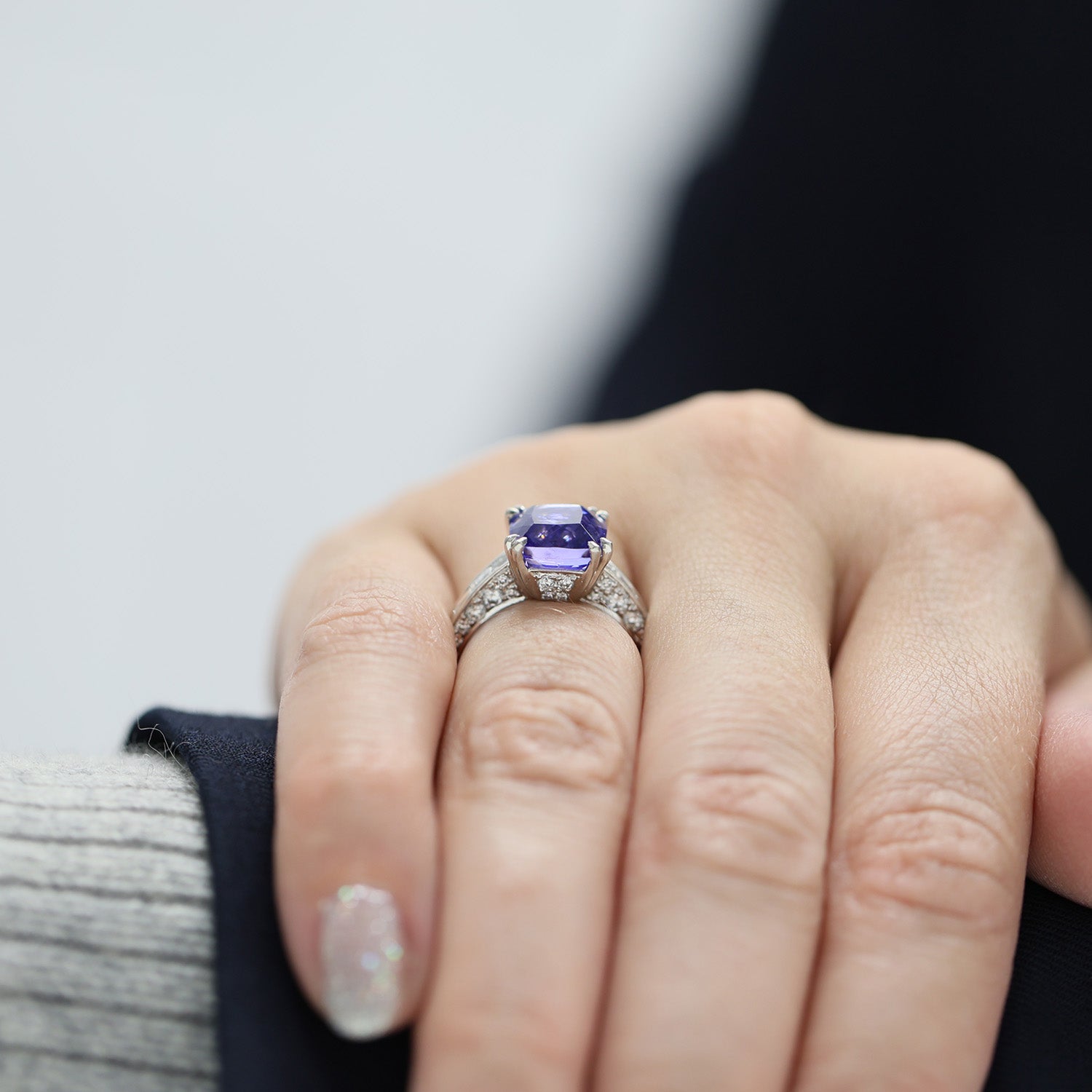 Platinum Tanzanite Ring With Baguette Diamond Shoulders & Diamond Pave Under Bezel