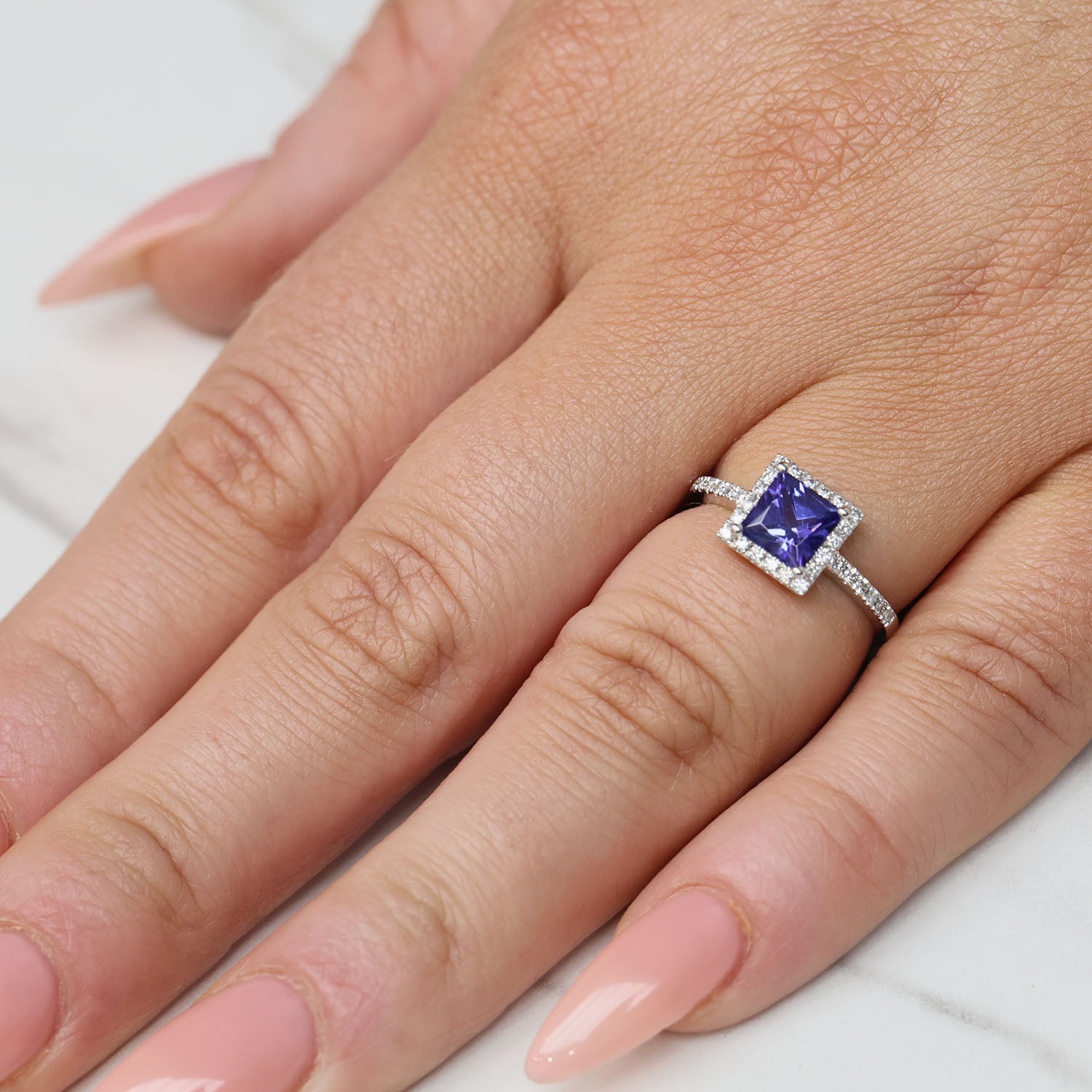 Platinum Square Cut Tanzanite And Diamond Cluster Ring