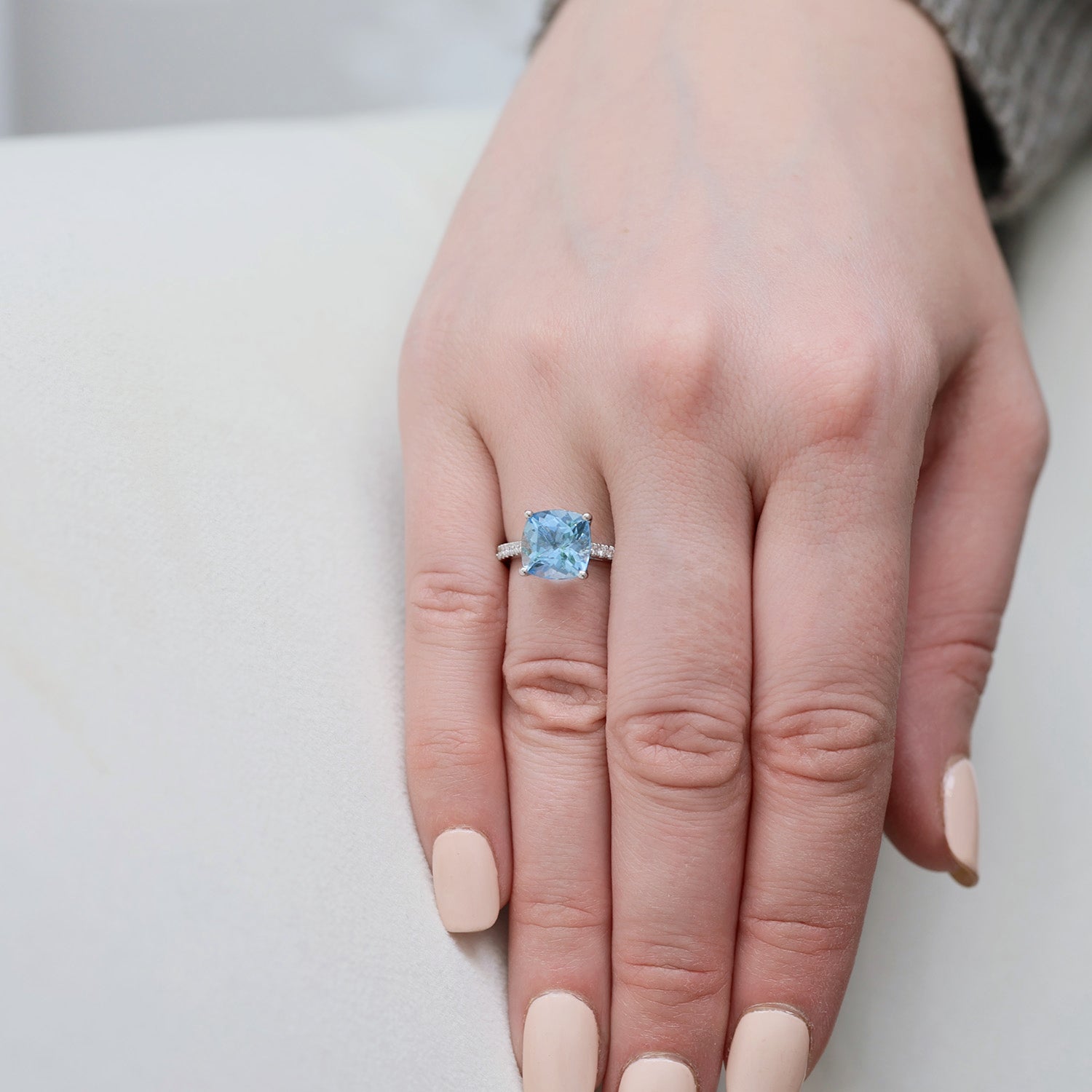 Platinum Cushion Cut Aquamarine Ring with Round Brilliant Diamond Set Shoulders