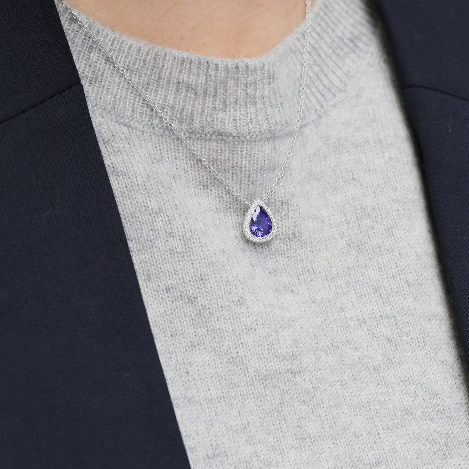 18ct White Gold Pear Cut Tanzanite And Diamond Halo Pendant