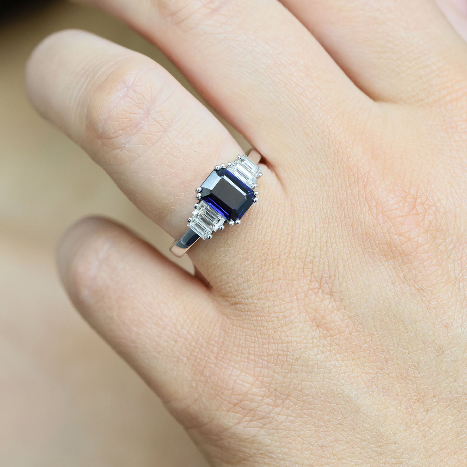 Platinum Emerald Cut Sapphire And Diamond Five Stone Dress Ring