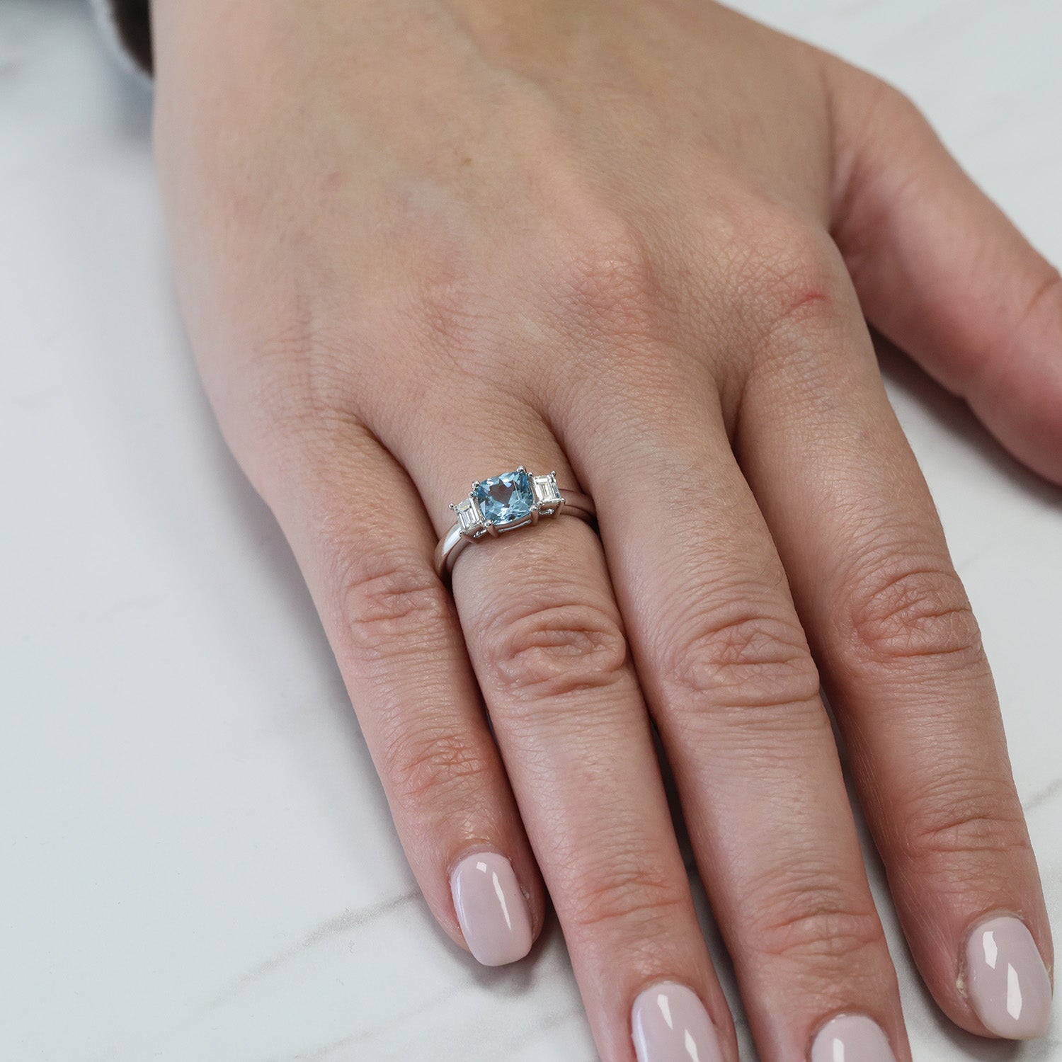 Platinum Aquamarine And Emerald Cut Diamond Three Stone Ring