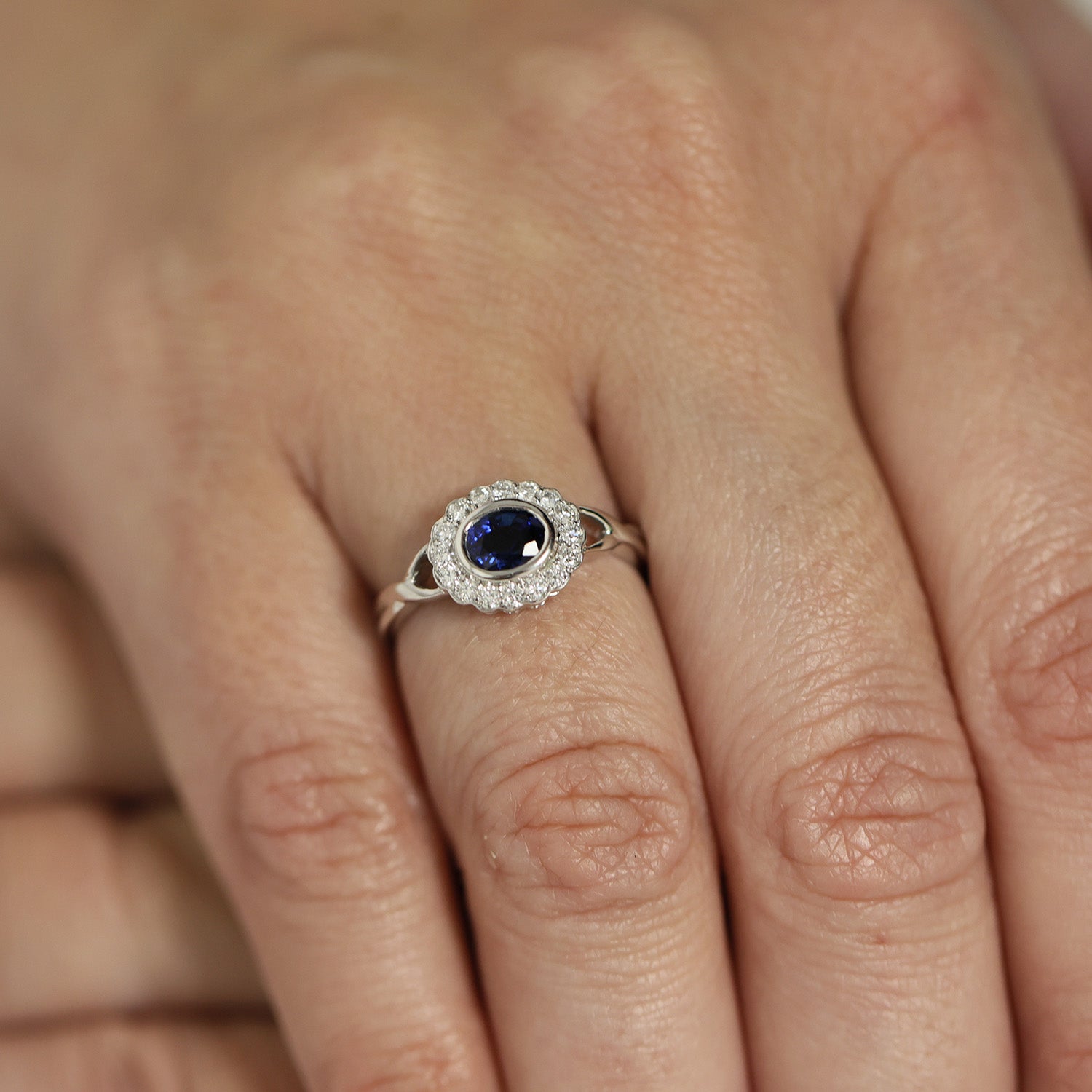 18ct White Gold Blue Sapphire and Brilliant Cut Diamond Rub Over Cluster Ring