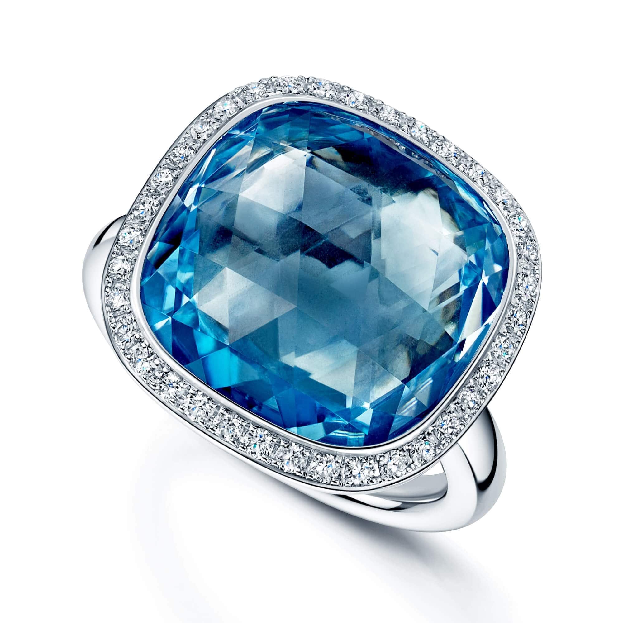 Berry's 18ct White Gold Cushion Cut Sky Blue Topaz And Round Brilliant Cut Diamond Halo Ring - Berry's Jewellers