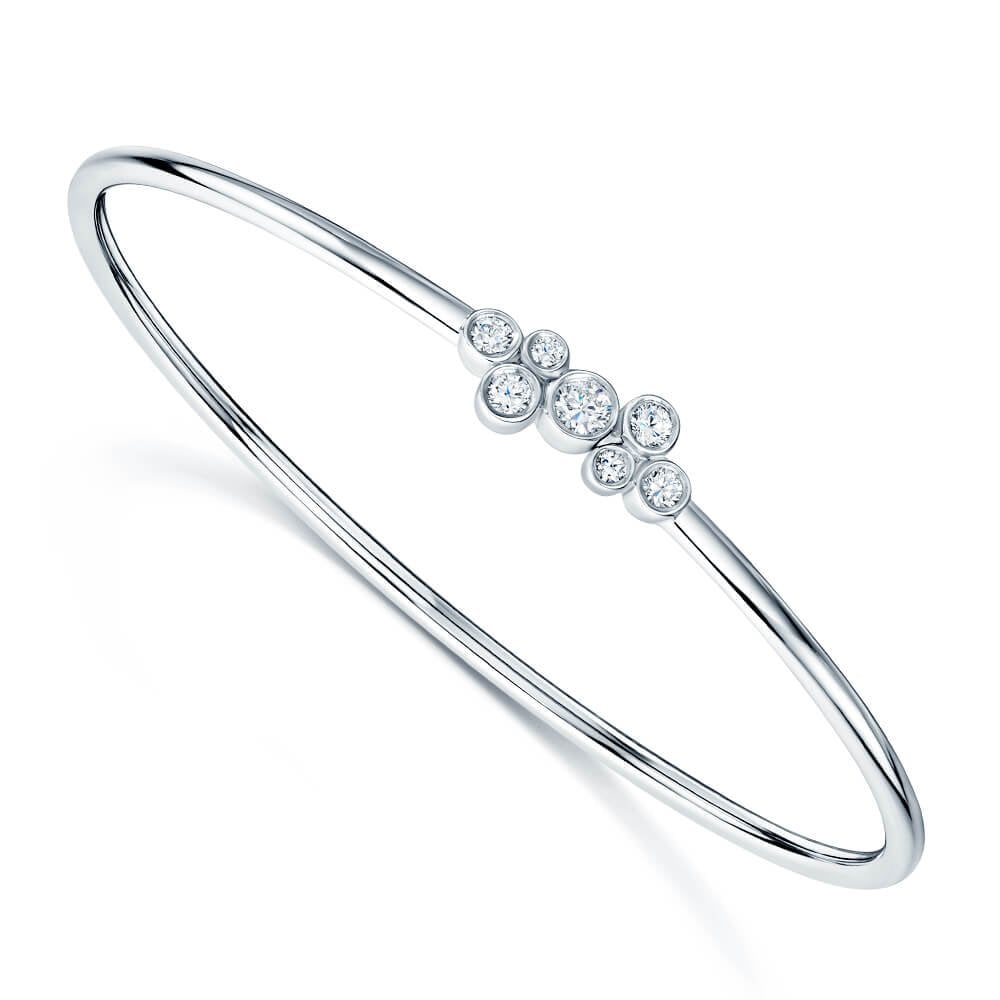 18ct White Gold Seven Stone Diamond Rubover Set Sprung Torque Bangle