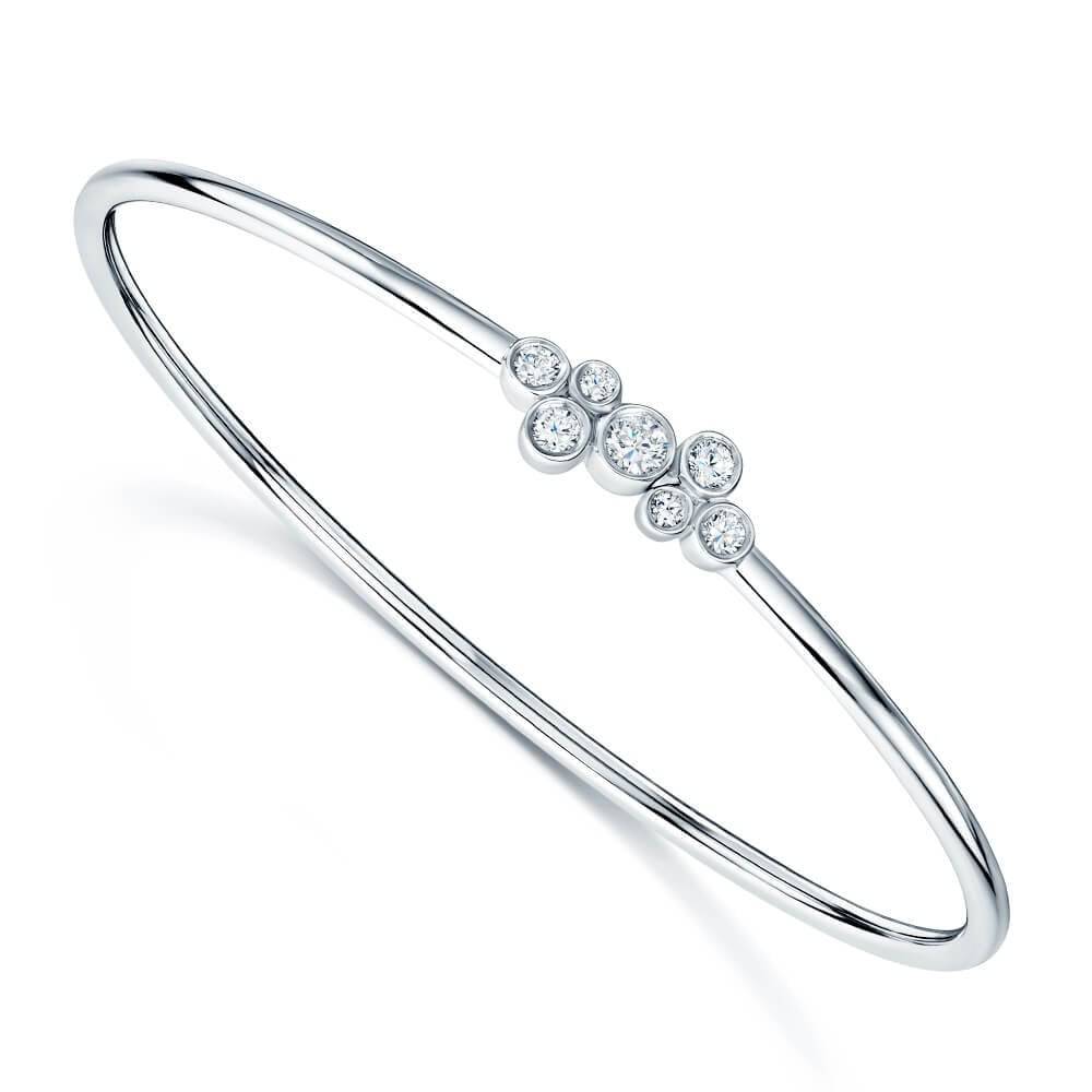 Berry's 18ct White Gold Seven Stone Diamond Rubover Set Sprung Torque Bangle - Berry's Jewellers