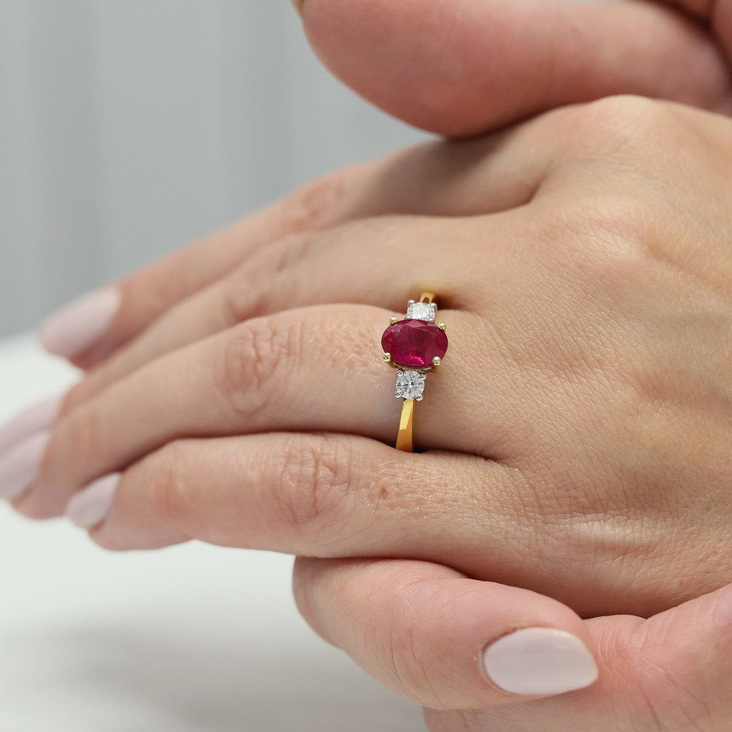 Berry's 18ct Yellow Gold Oval Ruby And Round Brilliant Cut Diamond Three Stone Ring - Berry's Jewellers