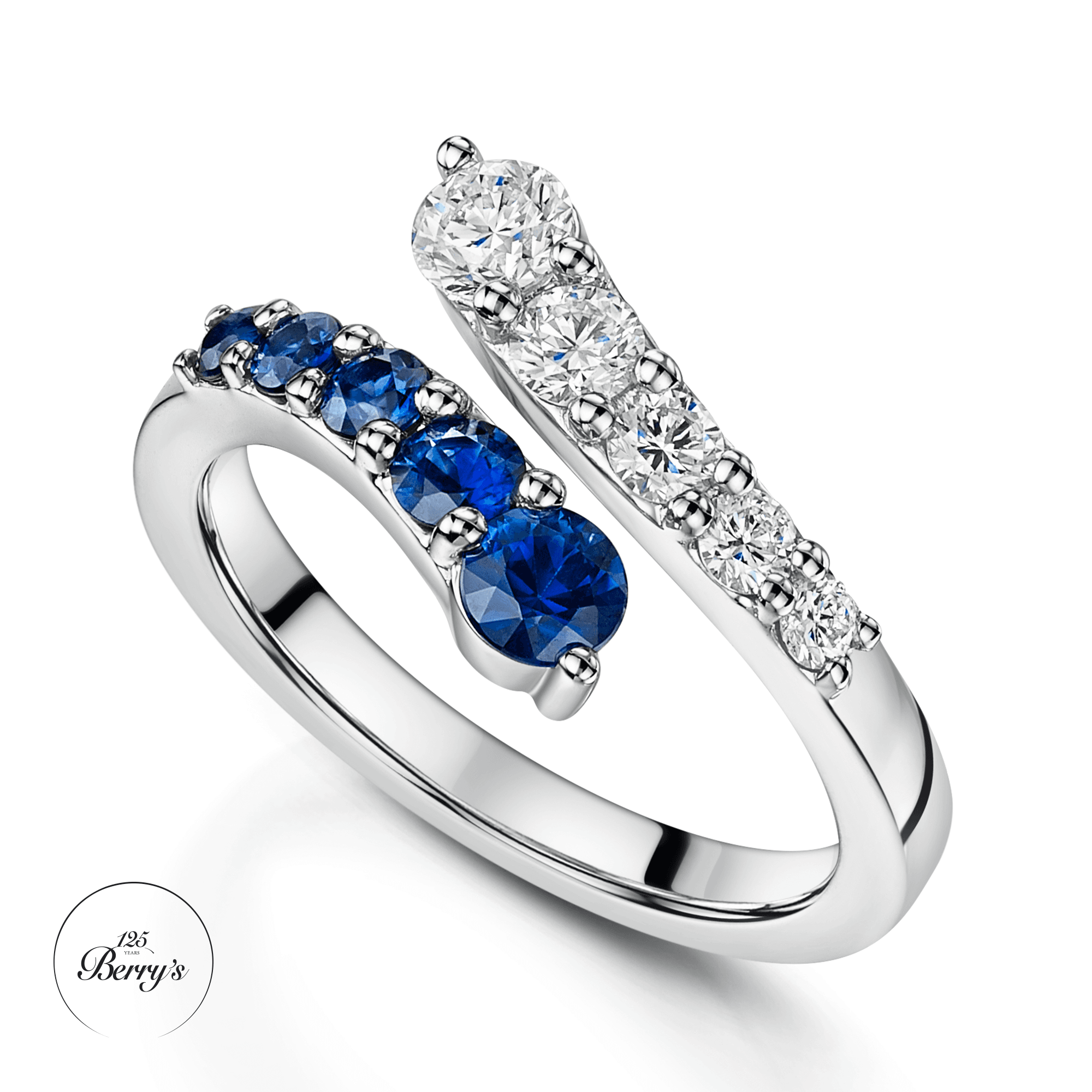 Berry's OPEIA Collection Platinum Round Brilliant Cut Sapphire And Diamond Fancy Single Row Cross Over Ring - Berry's Jewellers