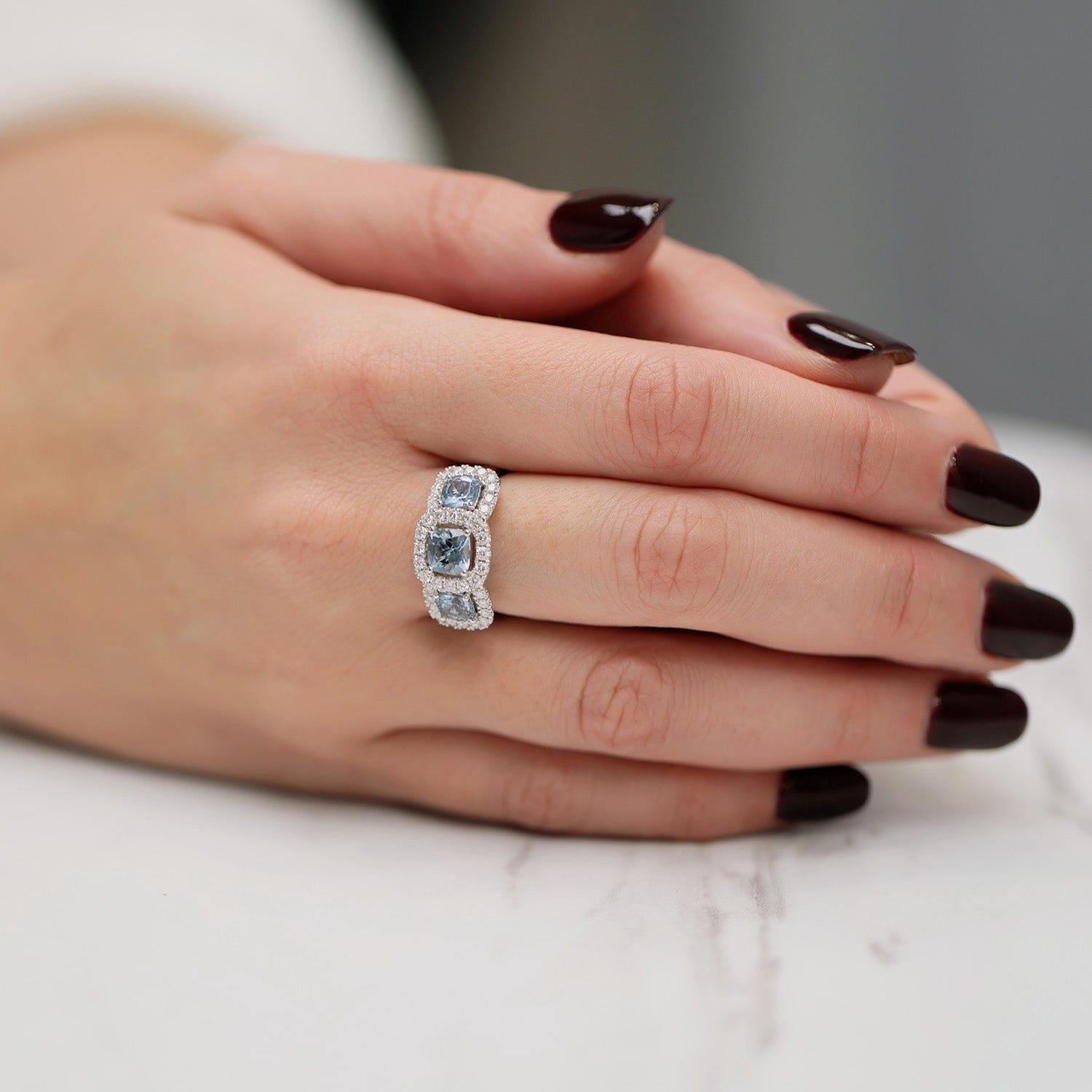 Berry's Platinum Aquamarine And Diamond Halo Three Stone Ring - Berry's Jewellers