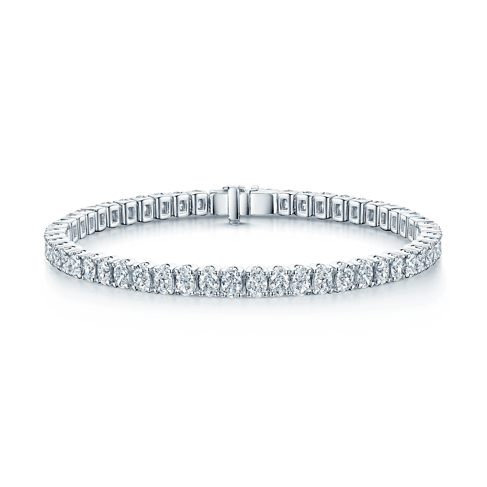 Platinum Claw Set Oval Cut Diamond Tennis Bracelet