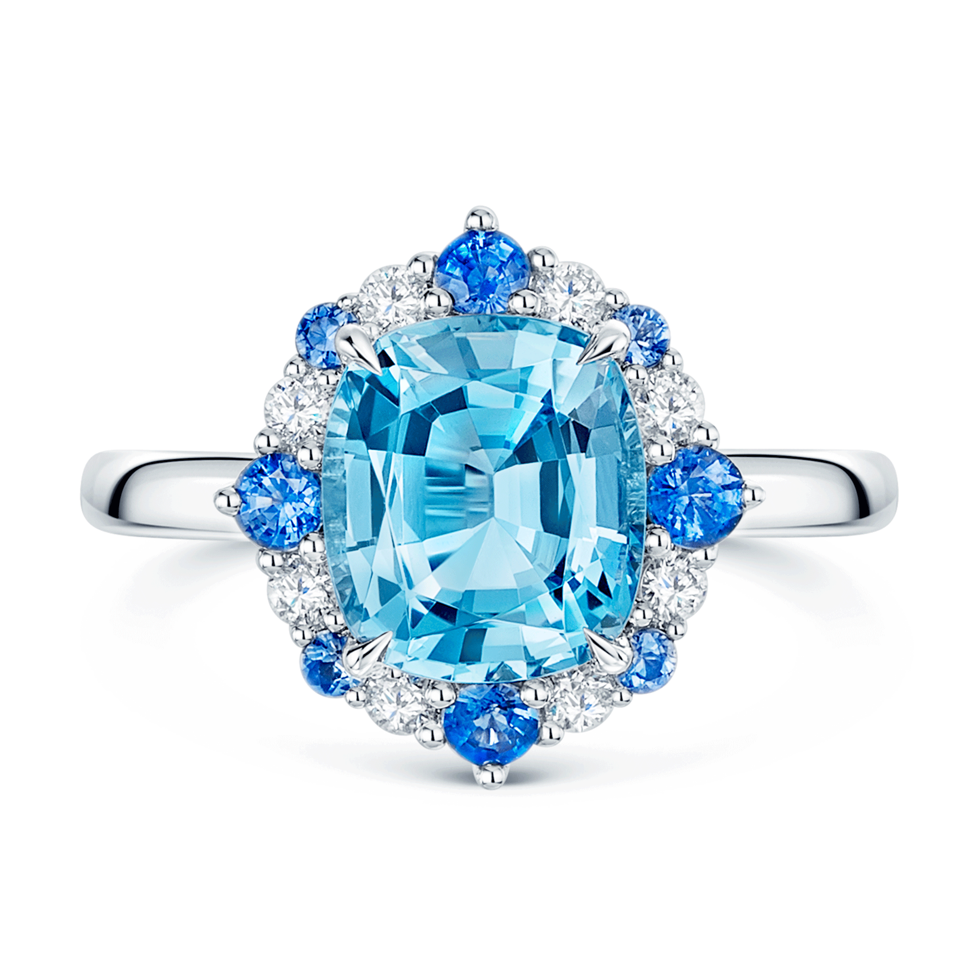 Platinum Cushion Cut Aquamarine Halo Dress Ring With Alternately Set Blue Sapphire and Diamonds.