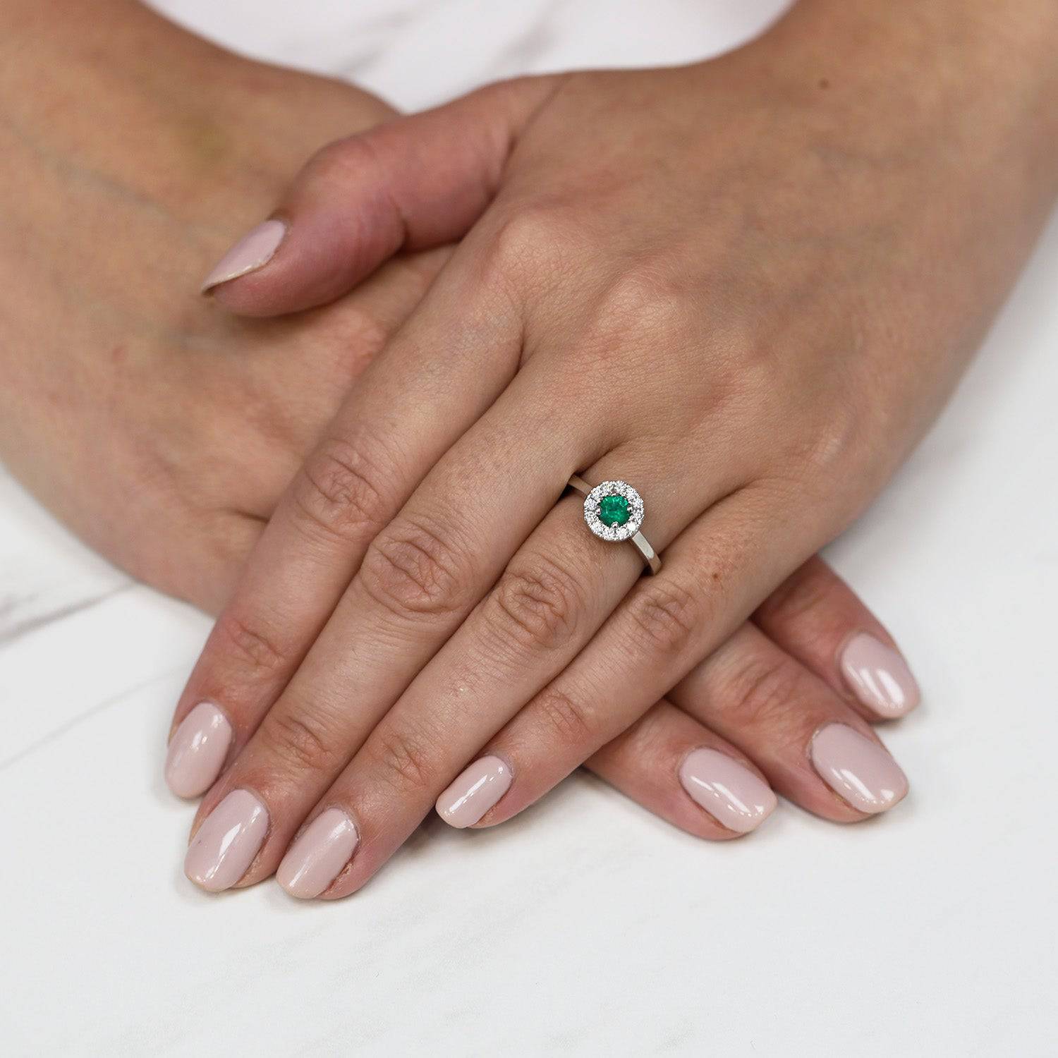 Platinum Emerald And Diamond Halo Surround Dress Ring