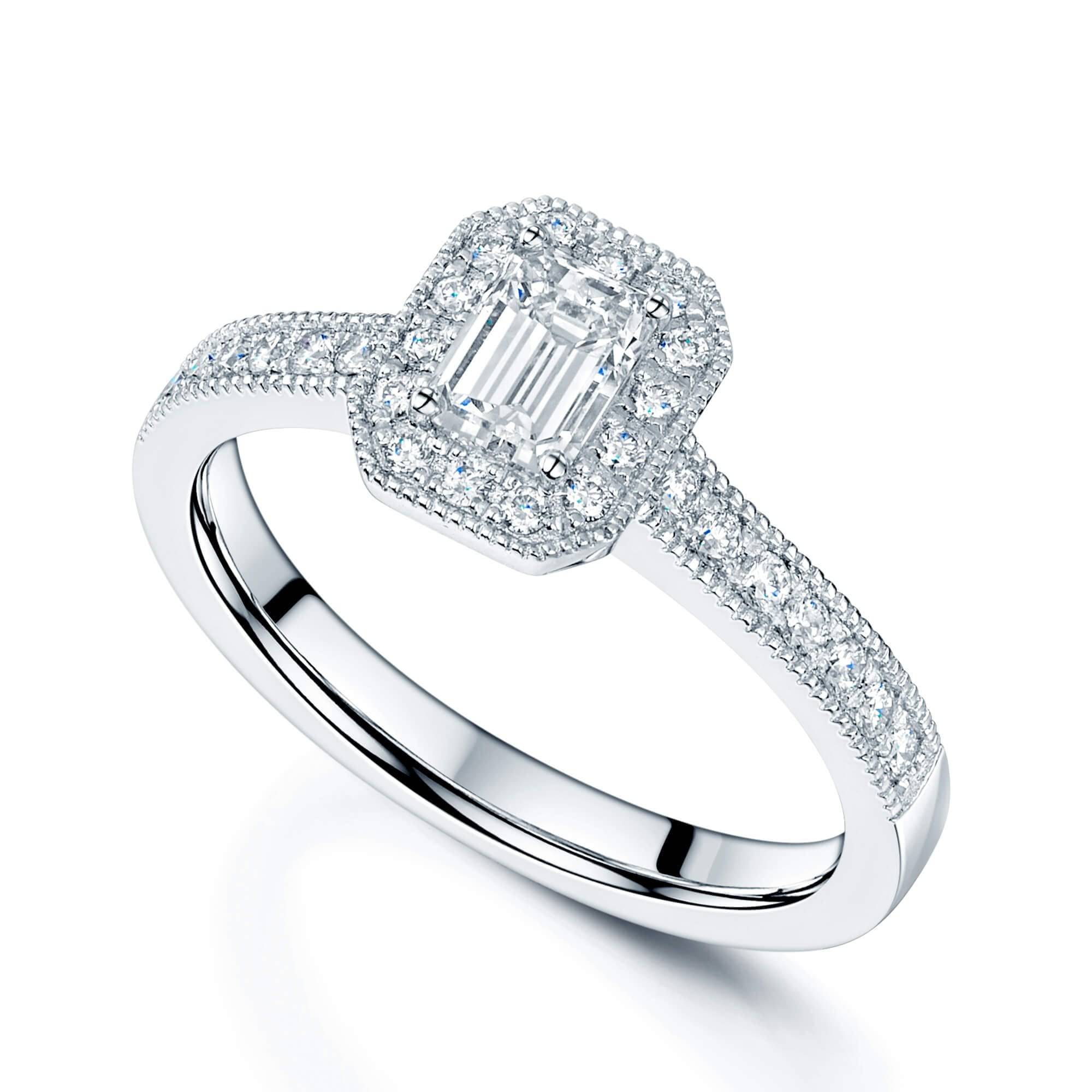 Berry's Platinum Emerald Cut Diamond Halo Ring With Millgrain Edge Round Brilliant Cut Diamond Shoulders - Berry's Jewellers