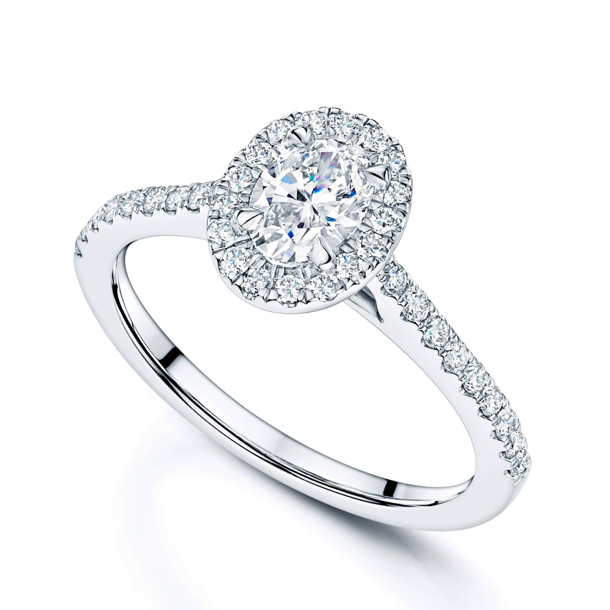 Platinum Oval Cut Diamond Halo Ring With Round Brilliant Diamond Shoulders