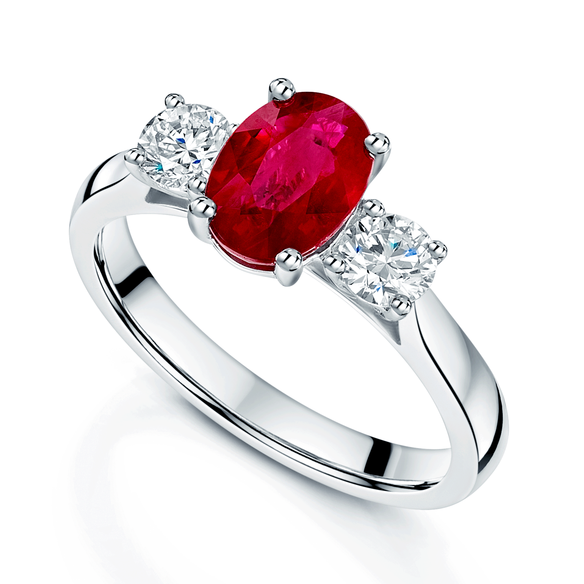 Platinum Oval Cut Ruby And Diamond Three Stone Ring