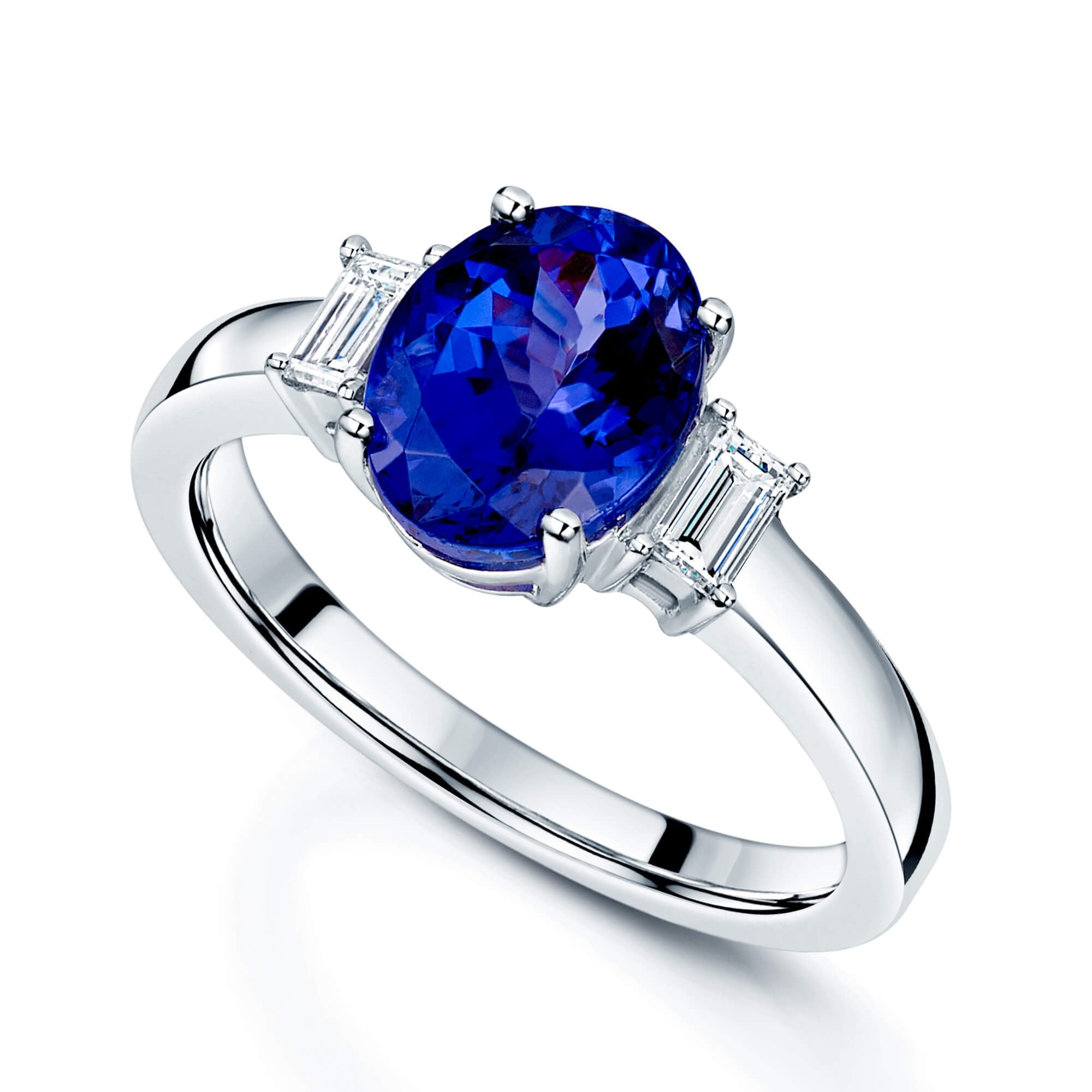 Platinum Oval Cut Tanzanite Ring With Baguette Diamond Shoulders