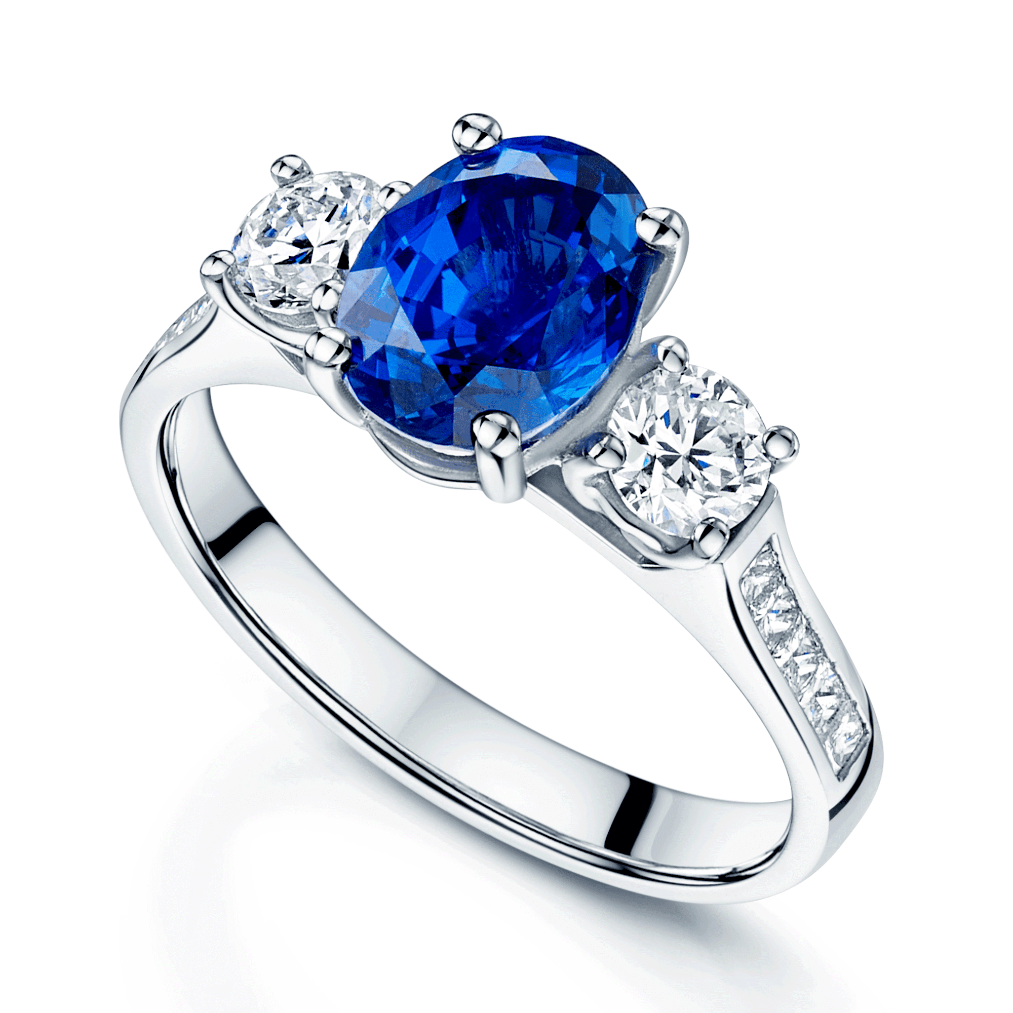 Berry's Platinum Oval Sapphire & Diamond Three Stone Ring With Channel Set Diamond Shoulders - Berry's Jewellers