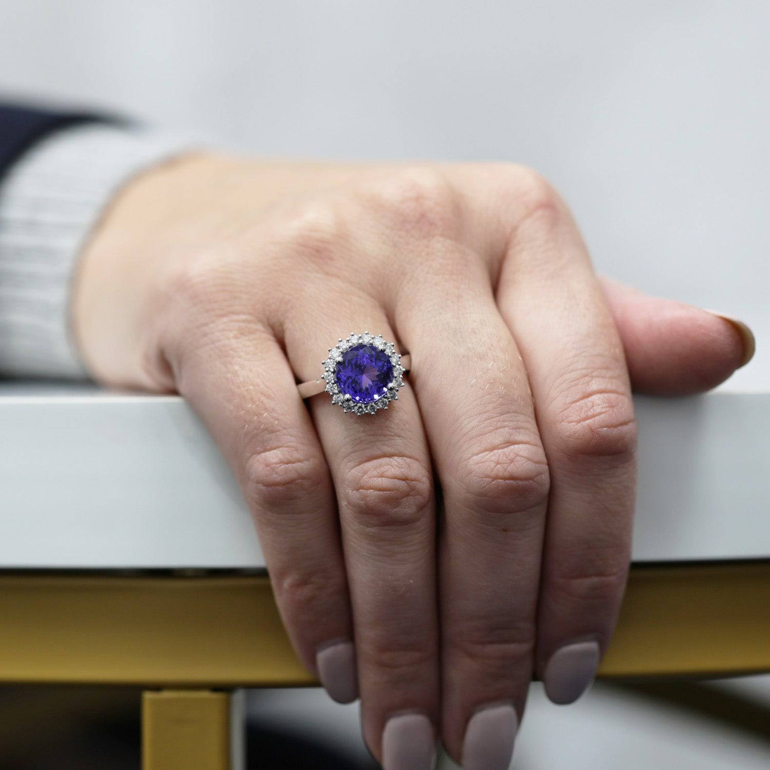 Berry's Platinum Round Tanzanite And Diamond Claw Set Cluster Ring - Berry's Jewellers