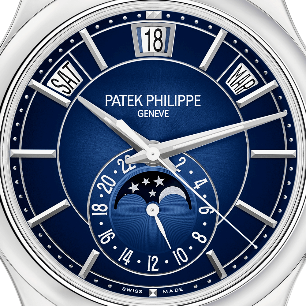 Patek Philippe Annual Calendar 18ct White Gold 40mm Blue Sunburst Dial Men's Watch - Berry's Jewellers