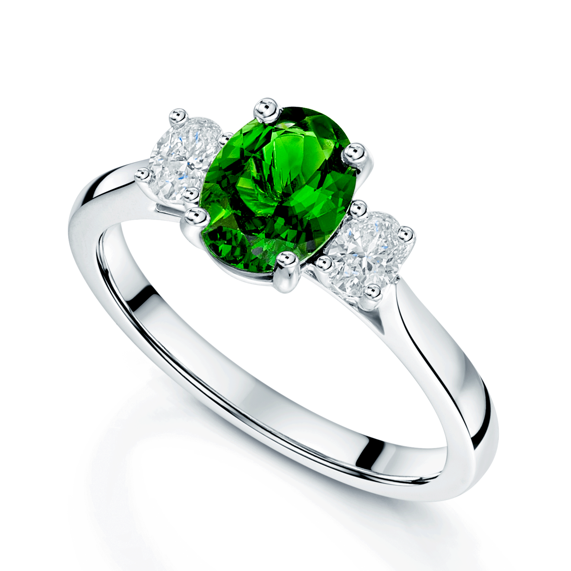 Platinum Oval Cut Tsavorite And  Diamond Three Stone Ring