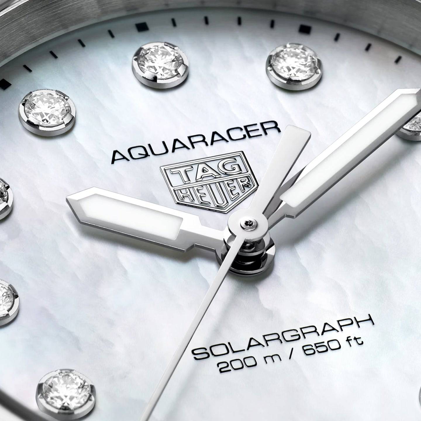 TAG Heuer Aquaracer Professional 200 Solargraph 34mm Mother of Pearl Diamond Dial Watch - Berry's Jewellers