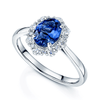 Platinum Oval Tanzanite And Round Brilliant Diamond Cluster Ring