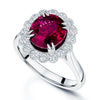 Platinum Oval Rhodolite Garnet Diamond Halo Ring