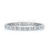 18ct White Gold Round Brilliant And Baguette Cut Diamond Flower Cluster Tennis Bracelet