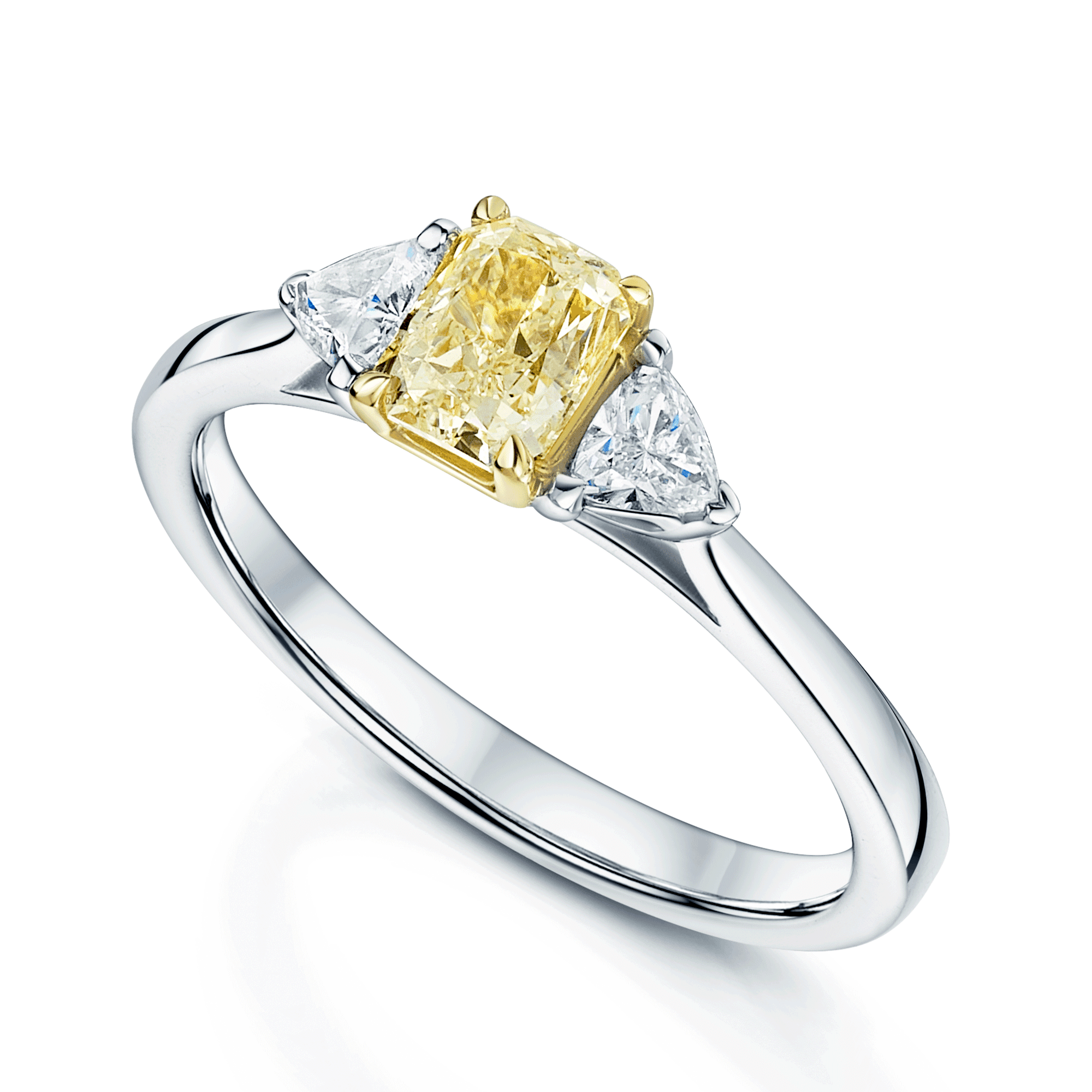 Platinum Radiant Cut Fancy Yellow Diamond And Trilliant Cut Diamond Three Stone Ring